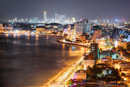 Beautiful view of Nha Trang City at night. Nha Trang is a popular tourist destination of Vietnam.の写真素材