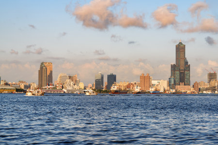 Kaohsiung skyline. Scenic view of Kaohsiung Harbor. 85 Sky Tower (Tuntex Sky Tower) and other modern buildings of downtown. The skyscraper is a landmark of Taiwan. Awesome cityscape.の写真素材