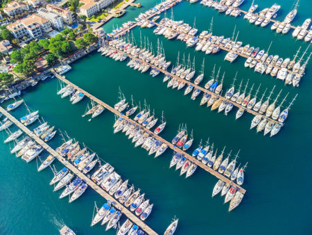 Aerial view of rows of yachts in Fethiye Marina, Turkey. Drone flying over the marina. Fethiye is a popular tourist destination in the Turkish Riviera.の写真素材