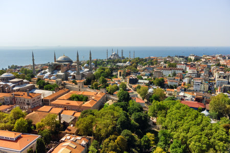 Awesome aerial view of the Hagia Sophia and the Topkapi Palace in Istanbul, Turkey. Drone flying over the city. The Bosporus is visible in background. Amazing cityscape.の写真素材