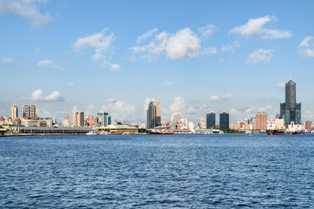 Awesome Kaohsiung skyline, Taiwan. Amazing view of Kaohsiung Harbor, 85 Sky Tower (Tuntex Sky Tower) and other modern buildings of downtown. The skyscraper is a landmark of Taiwan. Scenic cityscape.の写真素材