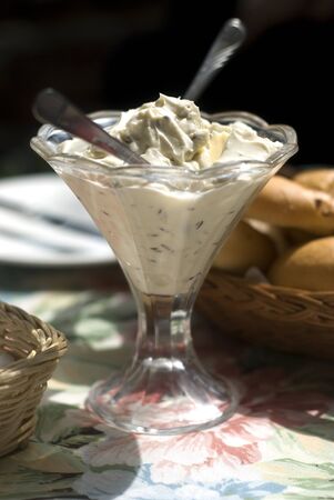 dip and fresh bread on tableの写真素材