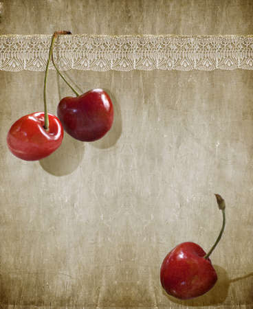 still life with cherry and laceの写真素材