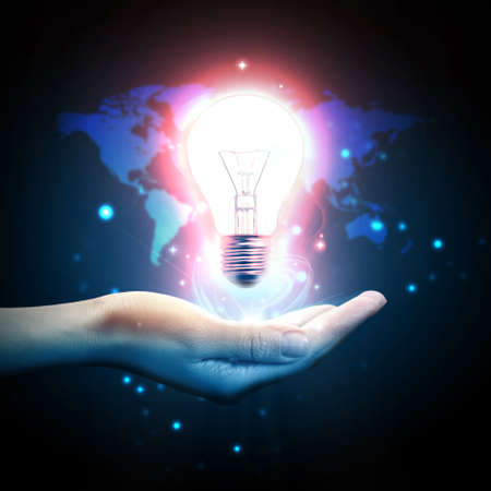 Light bulb on handの写真素材