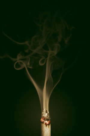 Burning cigaretteの写真素材