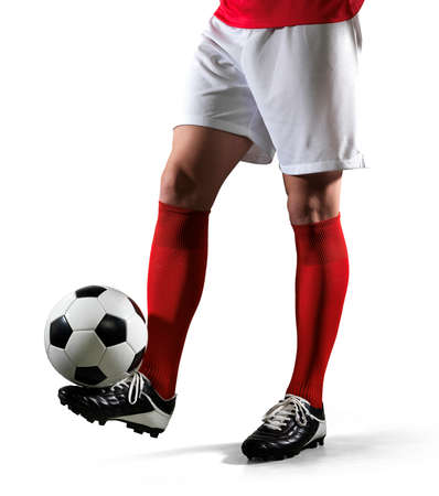 Football player with ball isolated on white background.の写真素材
