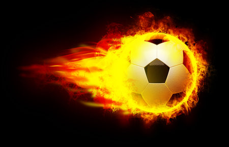 Soccer ball with fire on black backgroundの写真素材