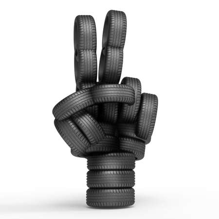 Victory sign made by vehicle tires on white background. Vehicle tires were modeled and rendered.の写真素材