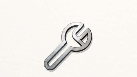 tools wench on the wall. 3D illustration of metallic sculpture over a white background with mild texture. equipment and designの写真素材