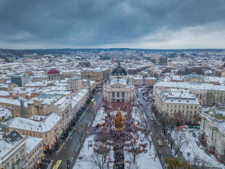 Lviv, Ukraine - 25, December 2018. Arial shot. Lvov Opera house. Christmas tree. Christmas Fair....