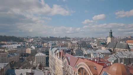 Lviv, Ukraine. March 20, 2019: Aerial Roofs and streets Old City Lviv, Ukraine. Central part of old...
