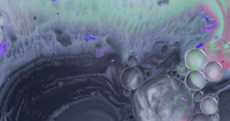 Fantastic structure with colorful bubbles. Abstract colorful paint. Top view. Bubbles in the liquid...