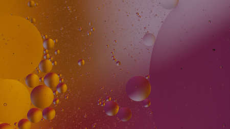 Fantastic structure of colorful oil bubbles. Chaotic motion. Abstract colorful paint. Top view....