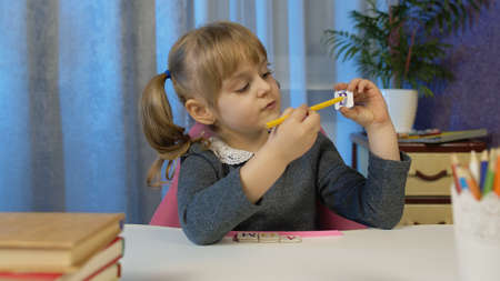 Online kids e-learning, children pupil distance education lesson, technology for kids. Child girl...