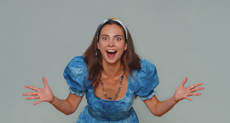 Oh my God, Wow. Excited amazed woman looking surprised at camera with big eyes, shocked by sudden...