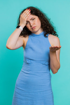 Face palm. Shame on you. Upset Caucasian young woman making face palm gesture, feeling bored,...