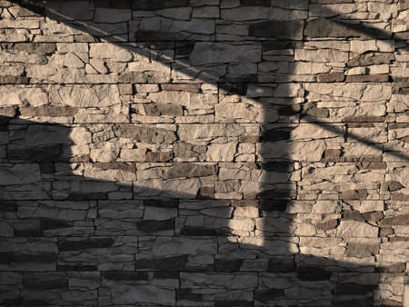 background shadow steps on the wall of artificial stone.の写真素材