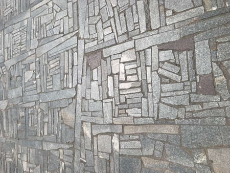 grey background texture granite floor of pieces of stone.