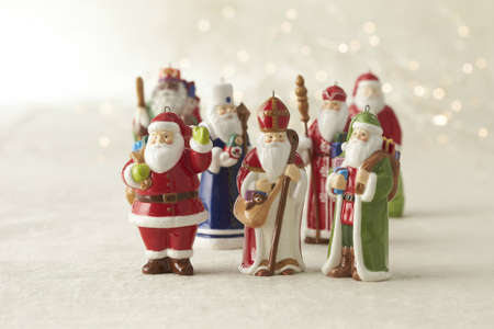 Ceramic Santas Figurines, Porcelain festive statuettes, group of Festive decorations.Collection of Vintage Santas.の写真素材
