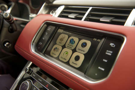 Car navigation system, car interiors inside view. Car navigation system in modern car interior with...