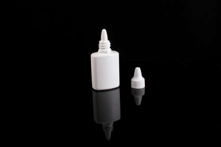 Nasal drop plastic bottle, black backgroundの写真素材