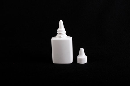 Spray drops plastic bottle for flu treatment, cap offの写真素材
