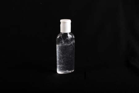 Hands sanitizer bottle black background