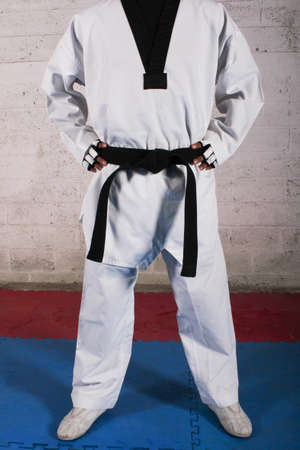 black belt taekwondo student in stance positionの写真素材