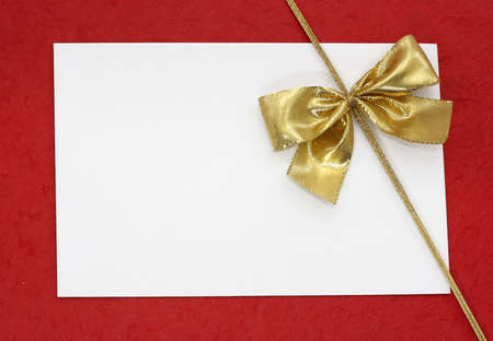 White blank note on red backgroundの写真素材