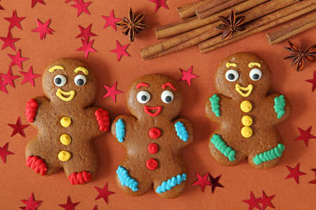  Gingerbread men on brown tablecloth 