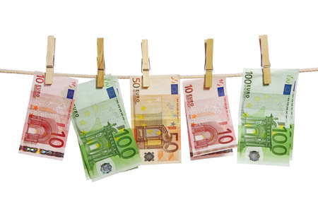  Money laundering on clothesline isolated on white background の写真素材