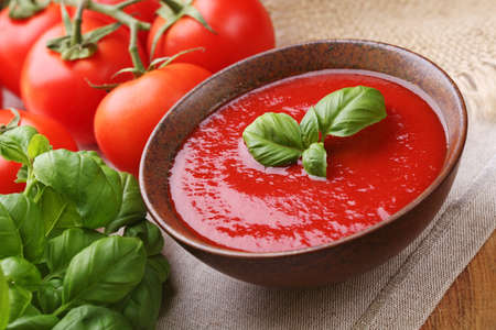 Traditional tomato soup with basilの写真素材