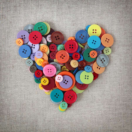 Colorful buttons heart on sackingの写真素材