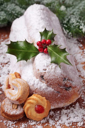 Stollen cake with holly berry leafの写真素材