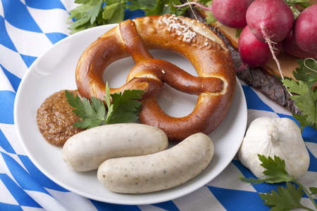 Bavarian white sausages with  sweet mustard and bretzels