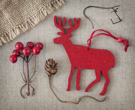  Red christmas deer on fabric backgroundの写真素材
