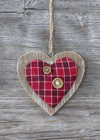 Heart over a wooden background