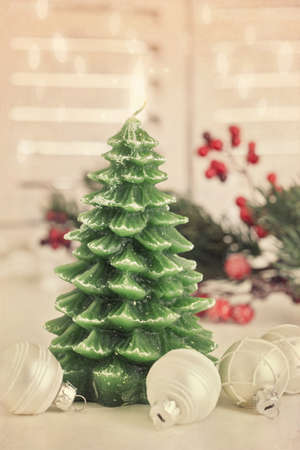 Christmas tree candle on white backgroundの写真素材