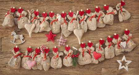 Advent calendar on wooden backgroundの写真素材