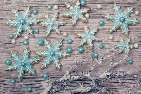 Pastel colored cookies on a wooden backgroundの写真素材