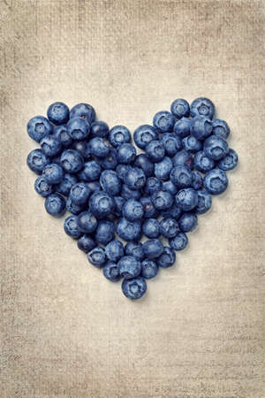 Heart from blackberries on a vintage backgroundの写真素材