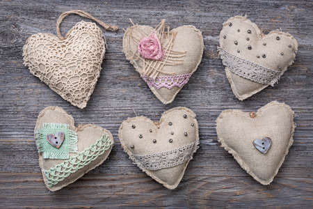 Vintage hearts on a wooden backgroundの写真素材