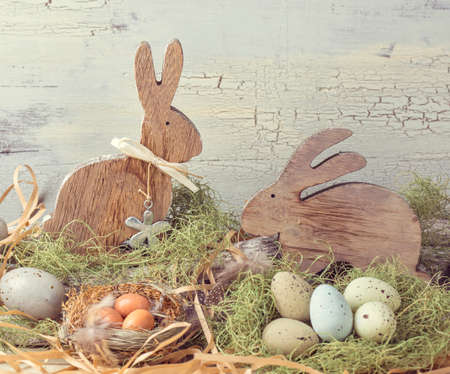 Easter pastel colored decoration on grass