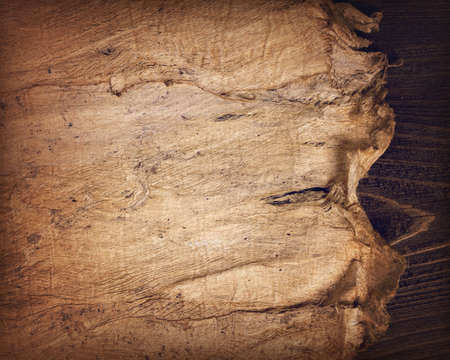 Old paper on wooden backgroundの写真素材