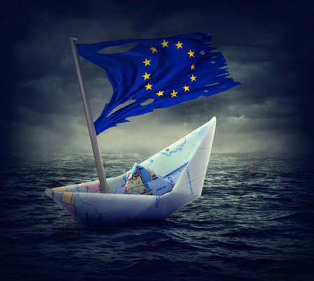 Sinking euro ship with a torn flag. Crisis concept.の写真素材