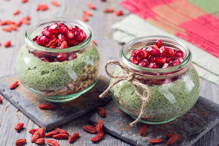 Chia seeds matcha pudding with pomegranate and chia seedsの写真素材