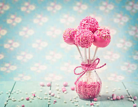 Pink cake pops in a vaseの写真素材