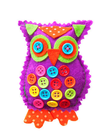 Handmade fabric owl isolated on a white backgroundの写真素材