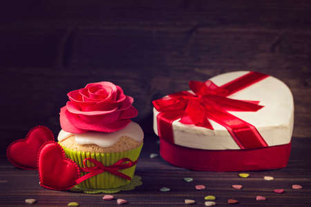 Cupcake with rose and a present for valentine's dayの写真素材