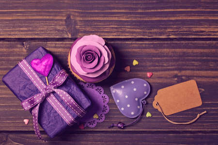 Cupcake with rose and a present for valentine's dayの写真素材